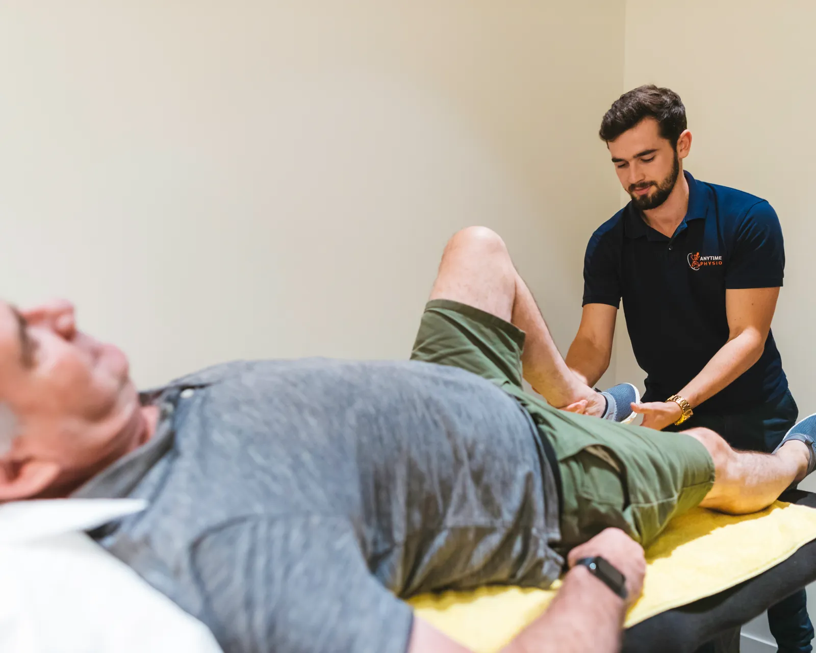 Physiotherapist treating a patient at Anytime Physio